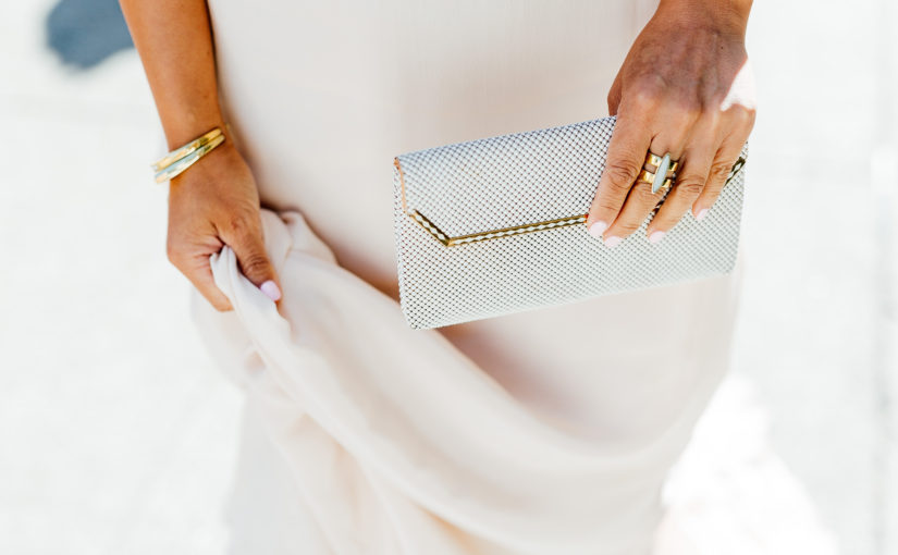 woman hold vintage clutch