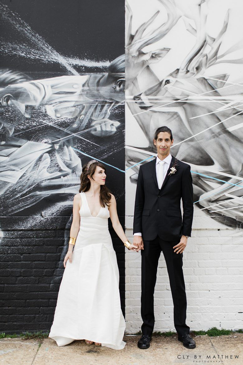 Alden Wicker and husband pose at their eco-friendly wedding in Brooklyn, New York.
